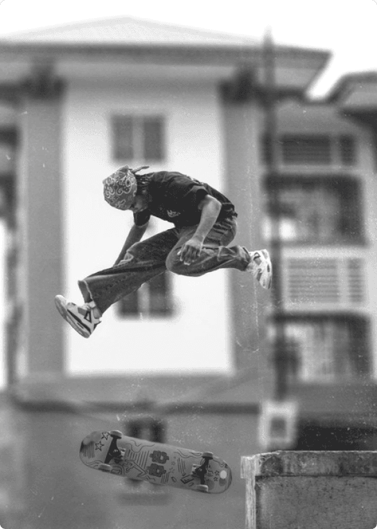skateboarder flipping